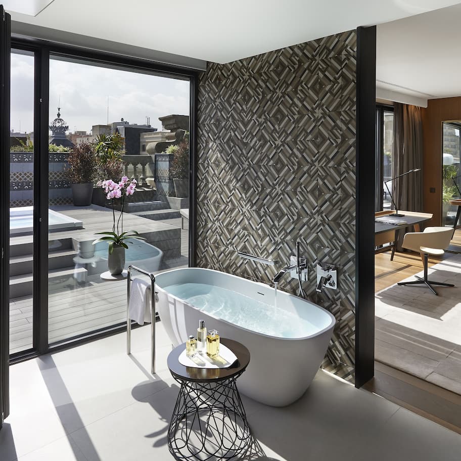 Designer toiletries, hair dryer, bathrobes, slippers