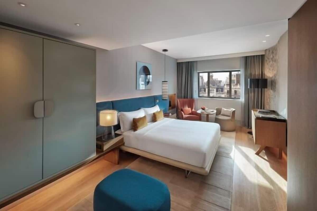 Roupas de cama premium, edredons de pluma, frigobar, cofres nos quartos