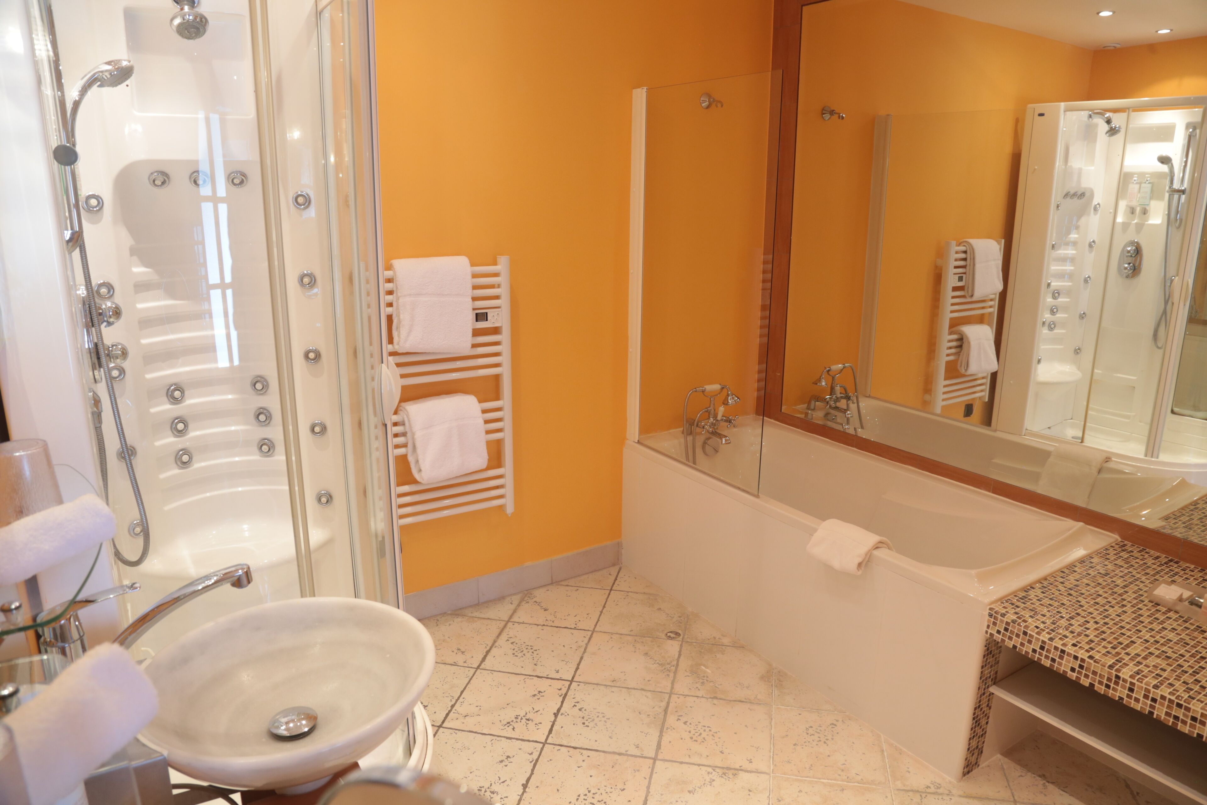 superior double room | bathroom | separate bathtub and shower, jetted bath, free toiletries