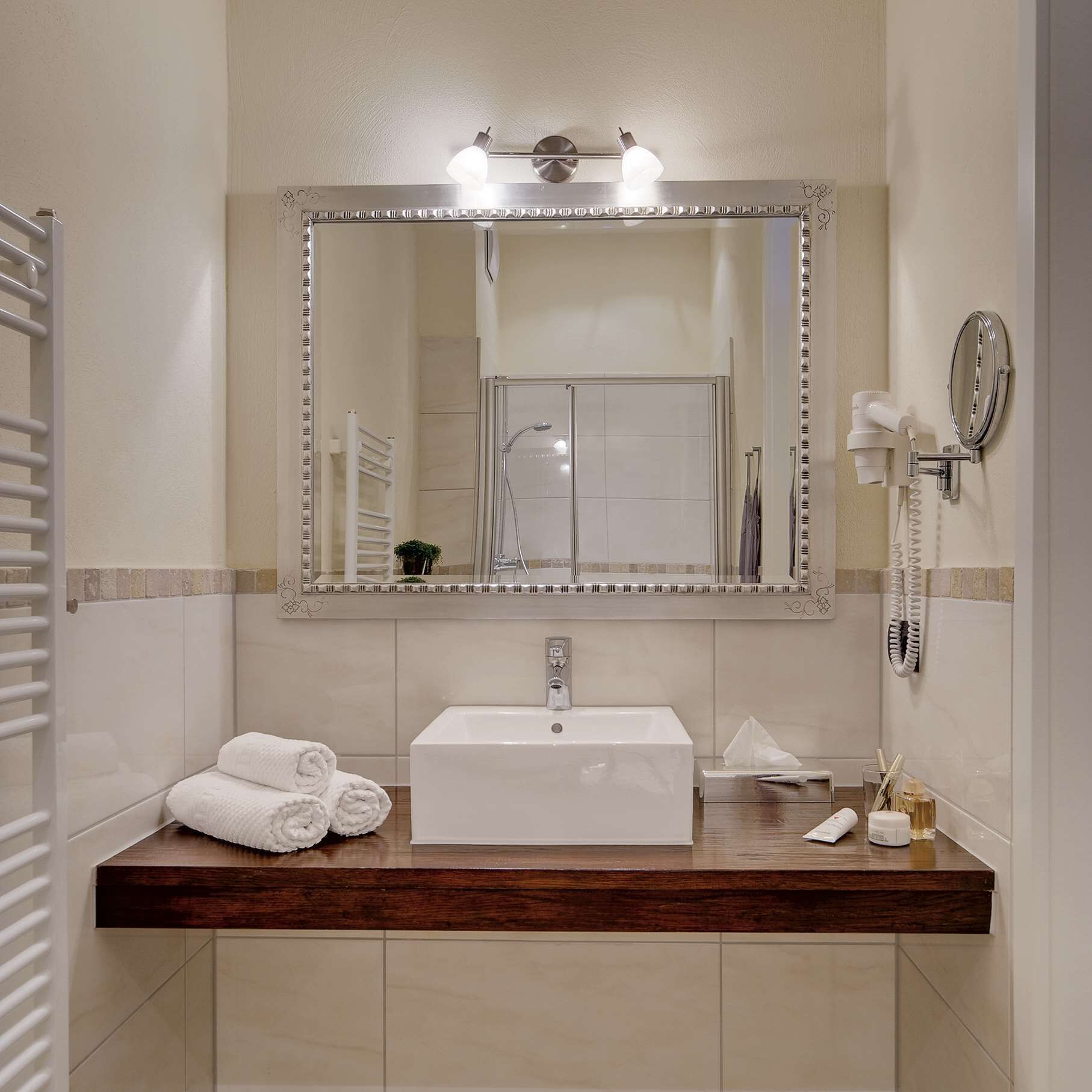 eco-friendly toiletries, hair dryer, bathrobes, towels