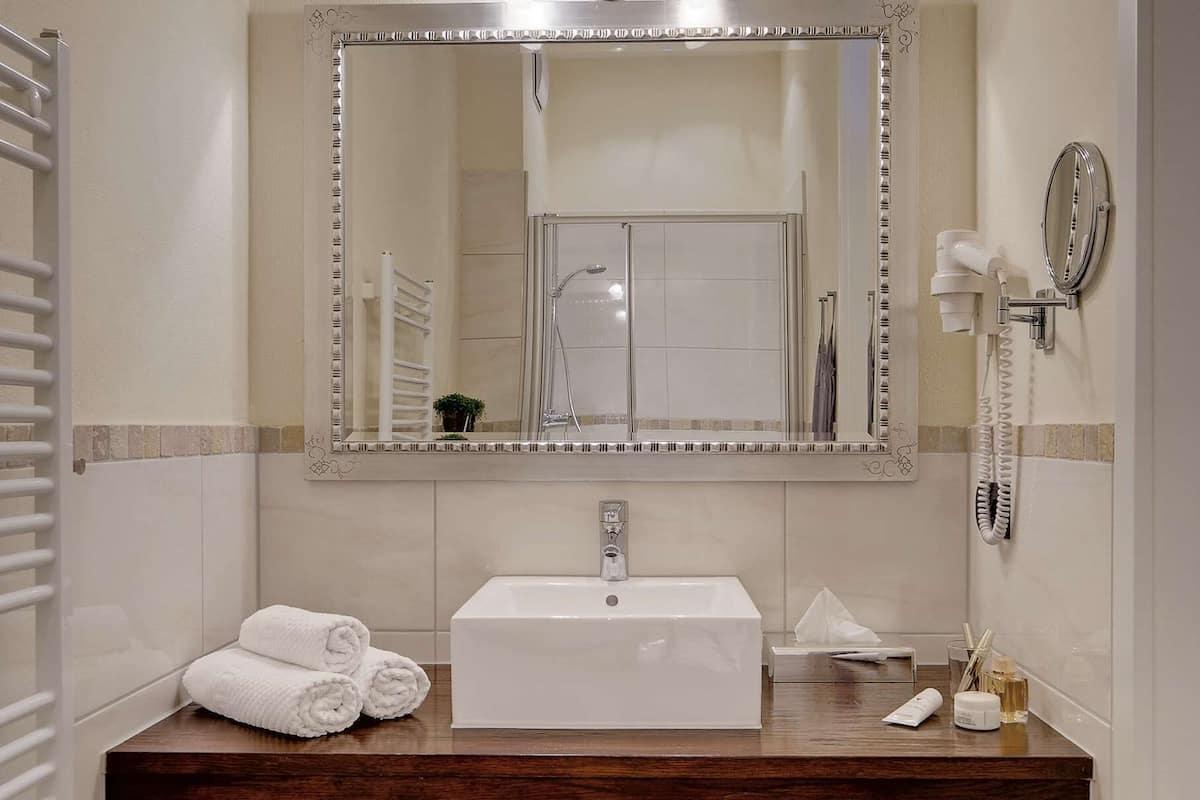 eco-friendly toiletries, hair dryer, bathrobes, towels