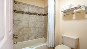 Deluxe Room, 2 Queen Beds | Bathroom | Combined shower/bathtub, free toiletries, hair dryer, towels