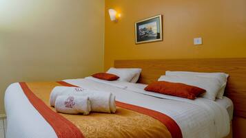 Double or Twin Room | Down comforters, Select Comfort beds, individually decorated