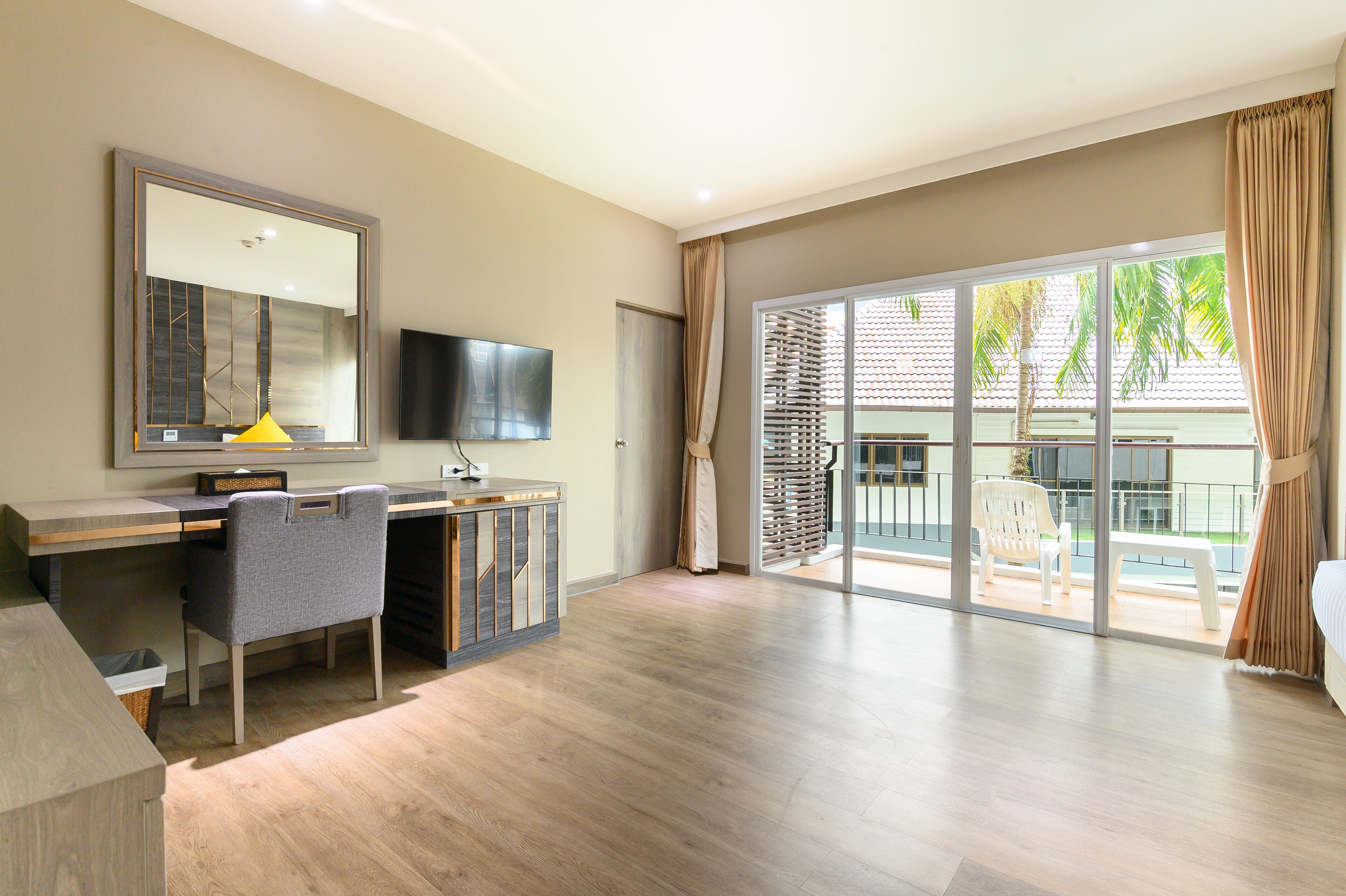 Family Grand Deluxe Suite | Living area | 29-inch plasma TV with cable channels, TV