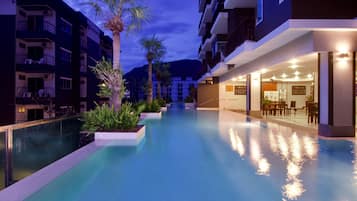 2 outdoor pools, pool umbrellas, sun loungers