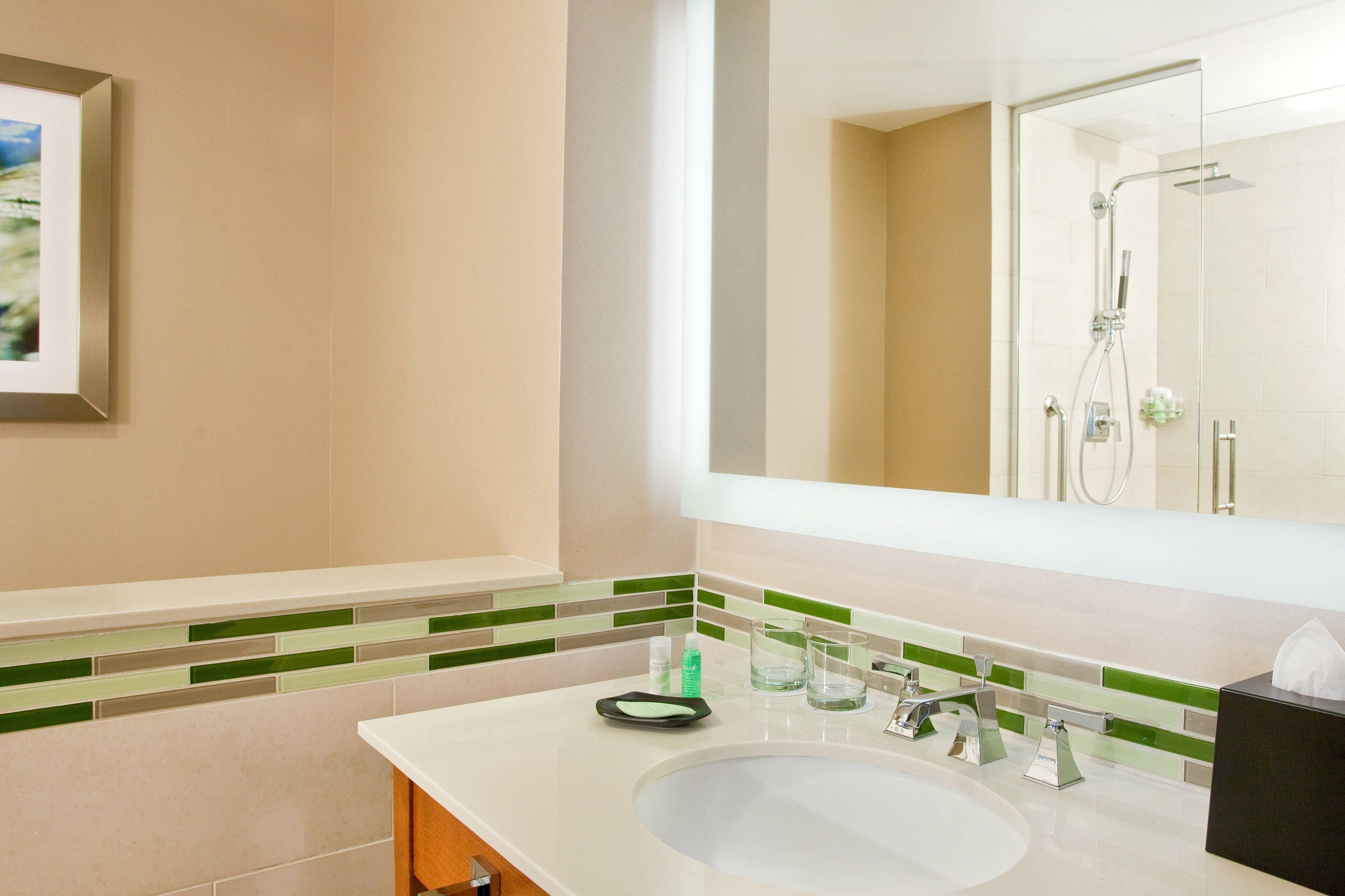 rainfall showerhead, designer toiletries, hair dryer, towels