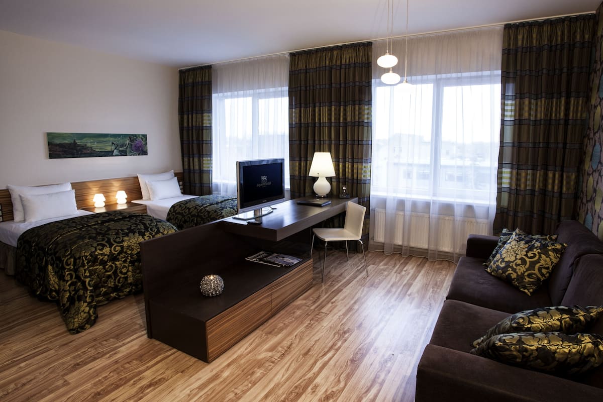 business double or twin room | living area | tv