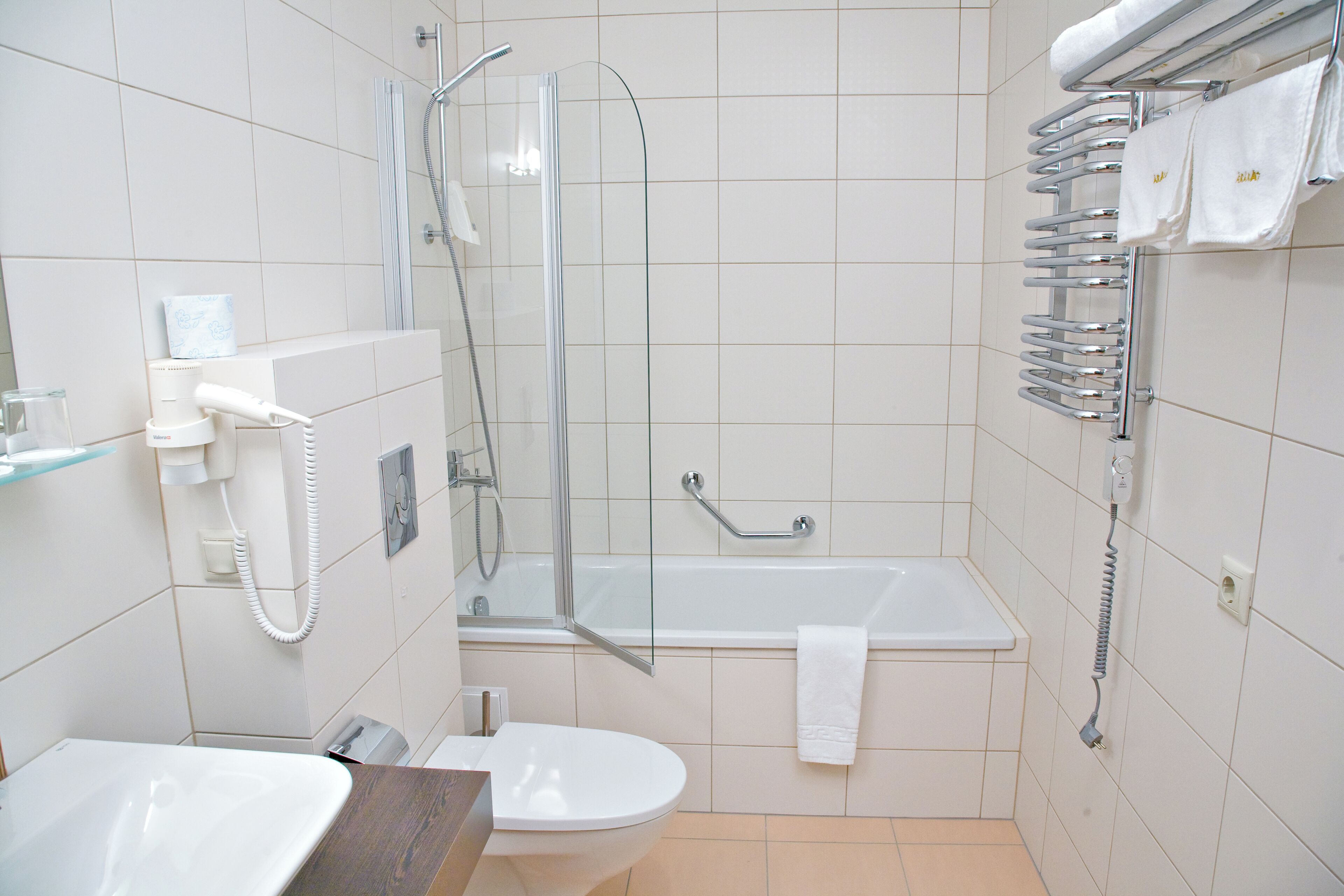 hair dryer, slippers, towels