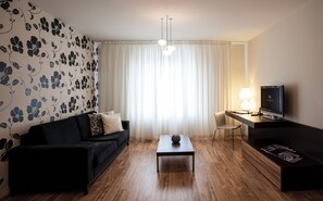 Standard-Apartment, 1 Schlafzimmer | Wohnbereich | Fernseher
