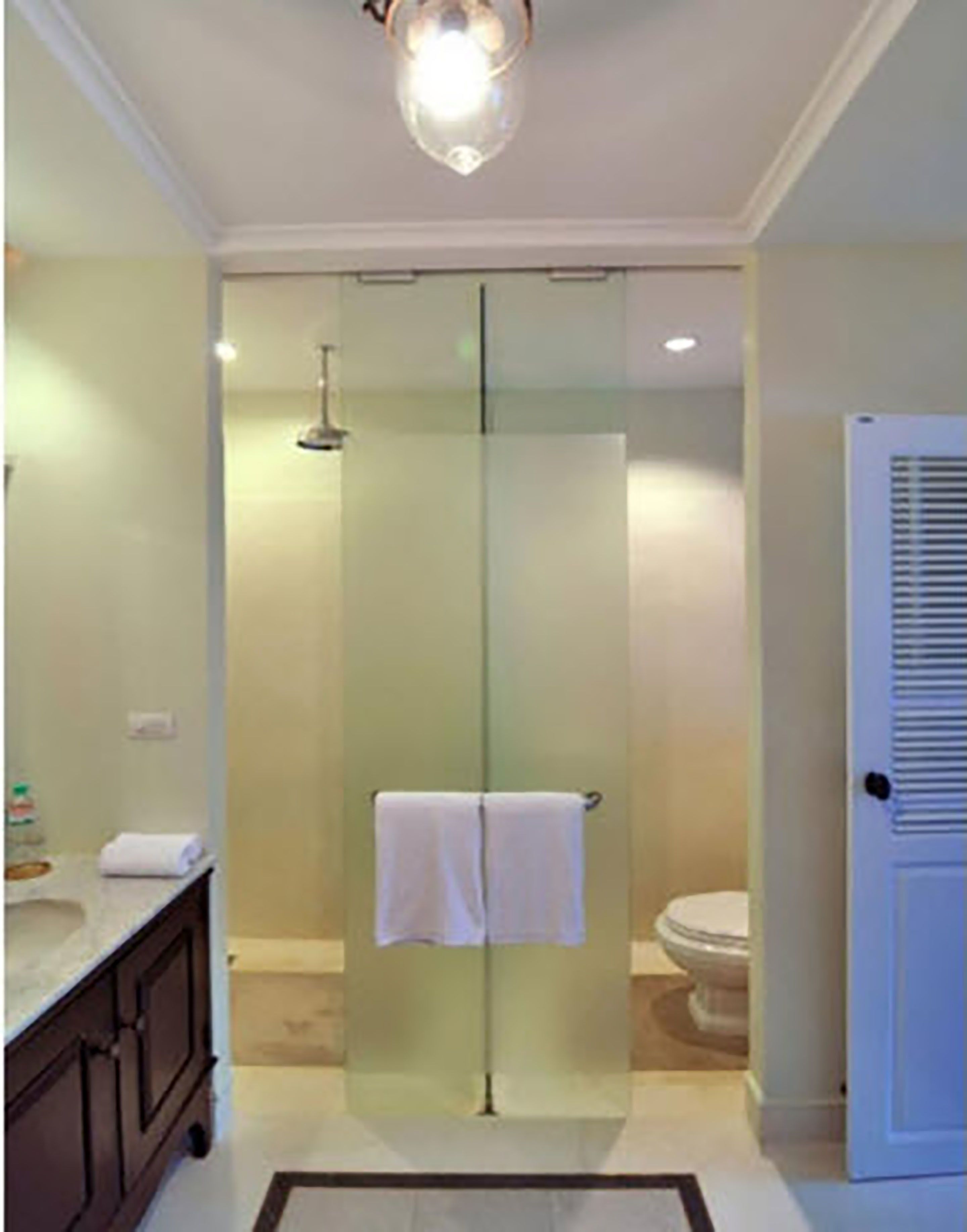 separate bathtub and shower, deep-soaking bathtub, designer toiletries