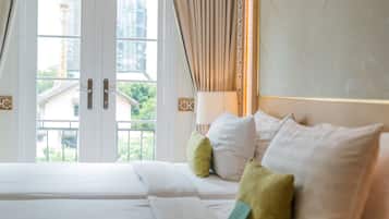 Deluxe Room | Select Comfort beds, in-room safe, desk, blackout drapes