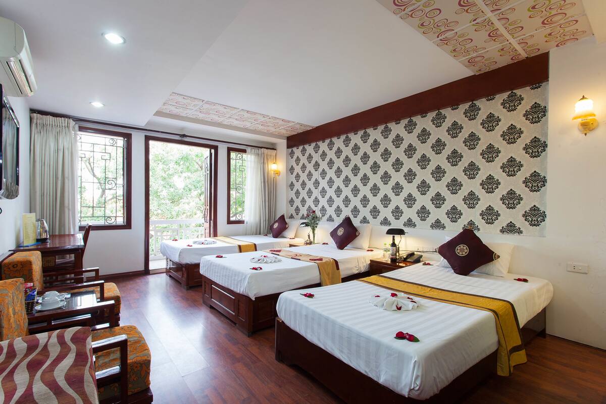 Suite (Triple) | Minibar (some free items), desk, cribs (free), rollaway beds (surcharge)