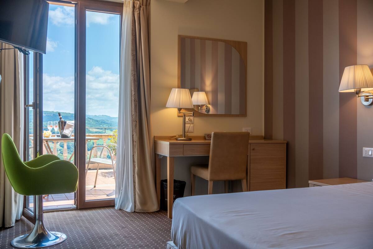 superior room, hill view | 1 bedroom, minibar, in-room safe, desk