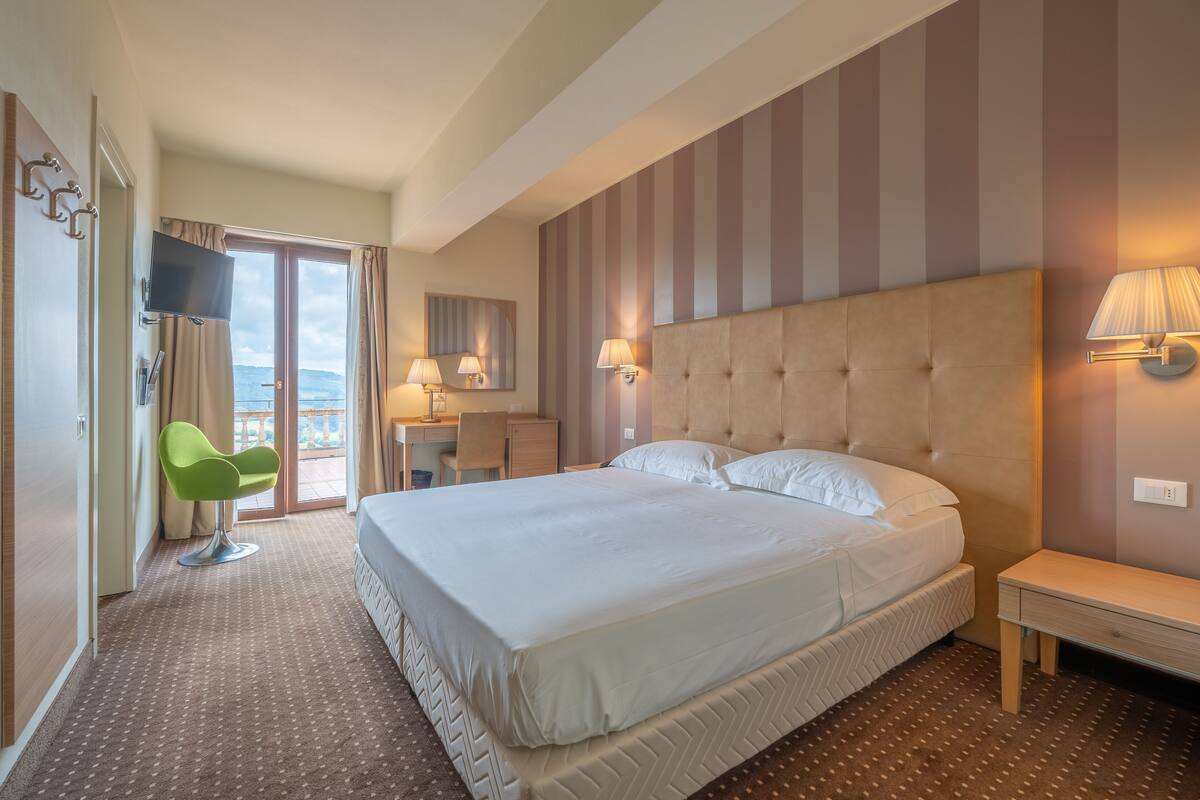 superior room, hill view | 1 bedroom, minibar, in-room safe, desk