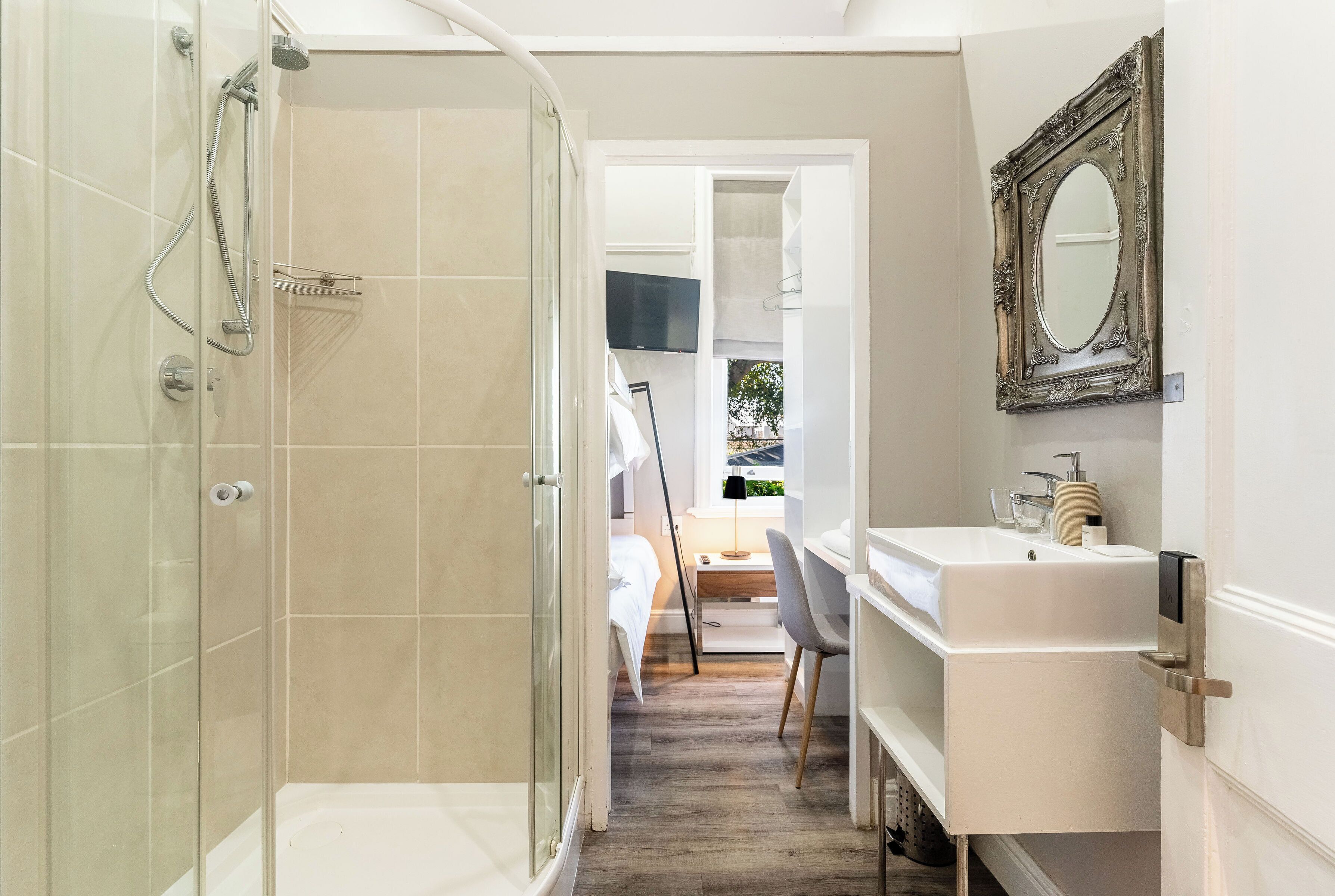 heritage suite interleading bunk beds | bathroom | shower, rainfall showerhead, hair dryer, towels