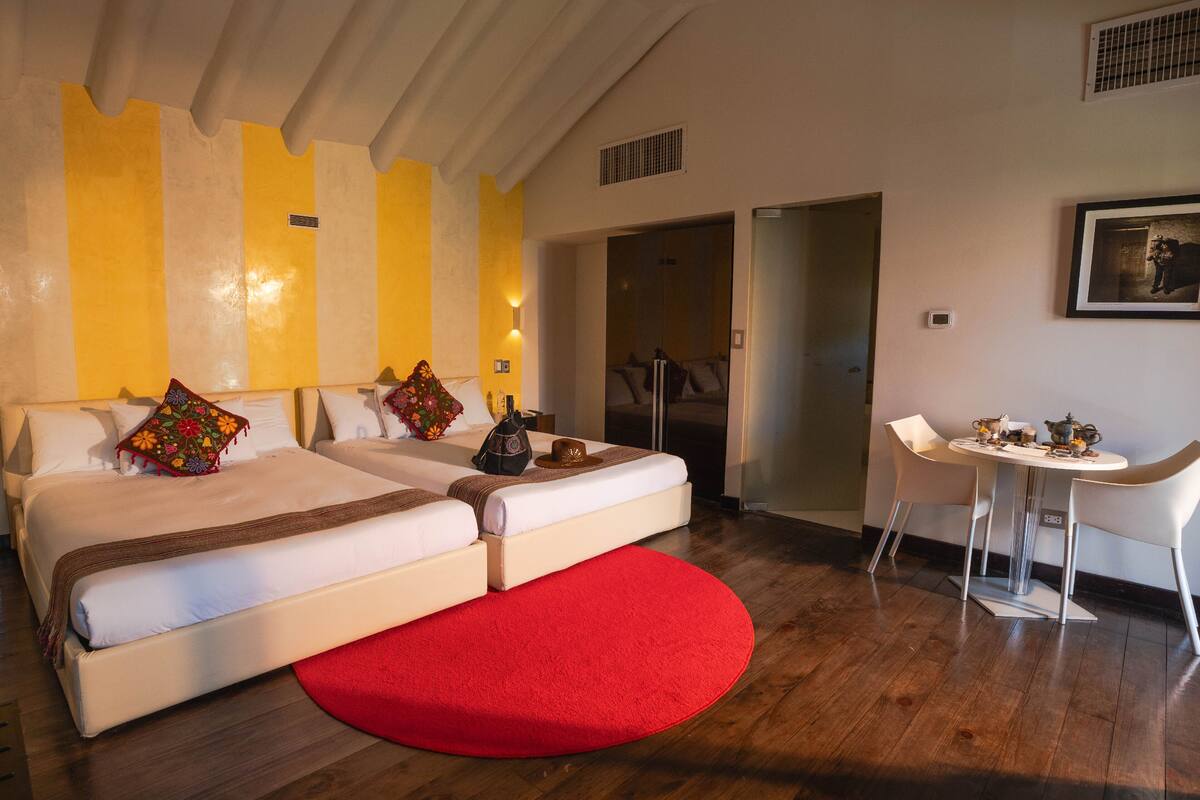 suite | frette italian sheets, select comfort beds, minibar, in-room safe