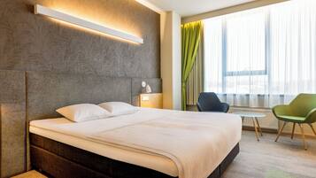 Superior-Doppel- oder -Zweibettzimmer | Zimmersafe, Schreibtisch, Verdunkelungsvorhänge, Bügeleisen/Bügelbrett