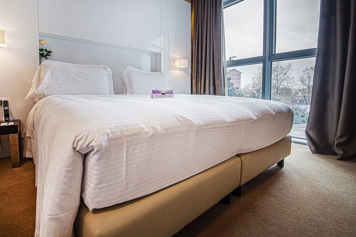 1 slaapkamer, donzen dekbedden, een minibar, een kluis op de kamer