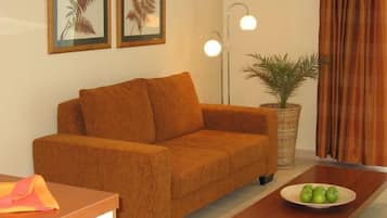 Appartement, 1 chambre (Erdgeschoss) | Coin séjour | Télévision à écran plat, lecteur de DVD