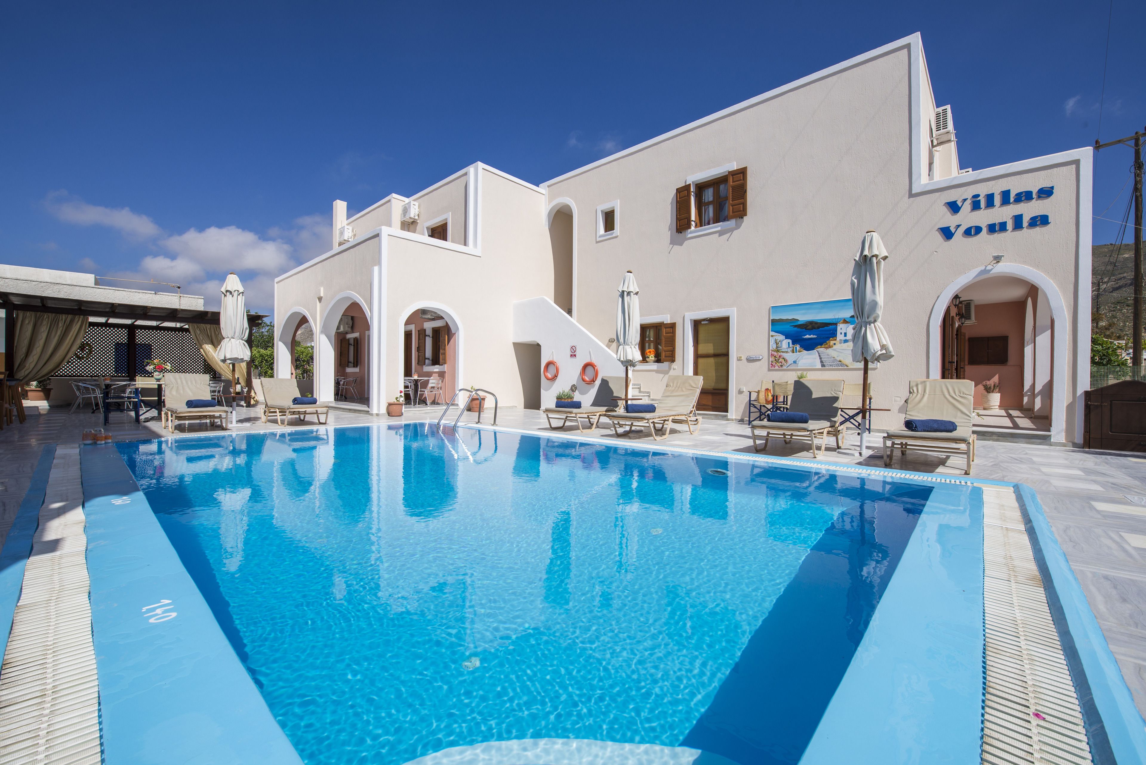 outdoor pool, pool umbrellas, pool loungers