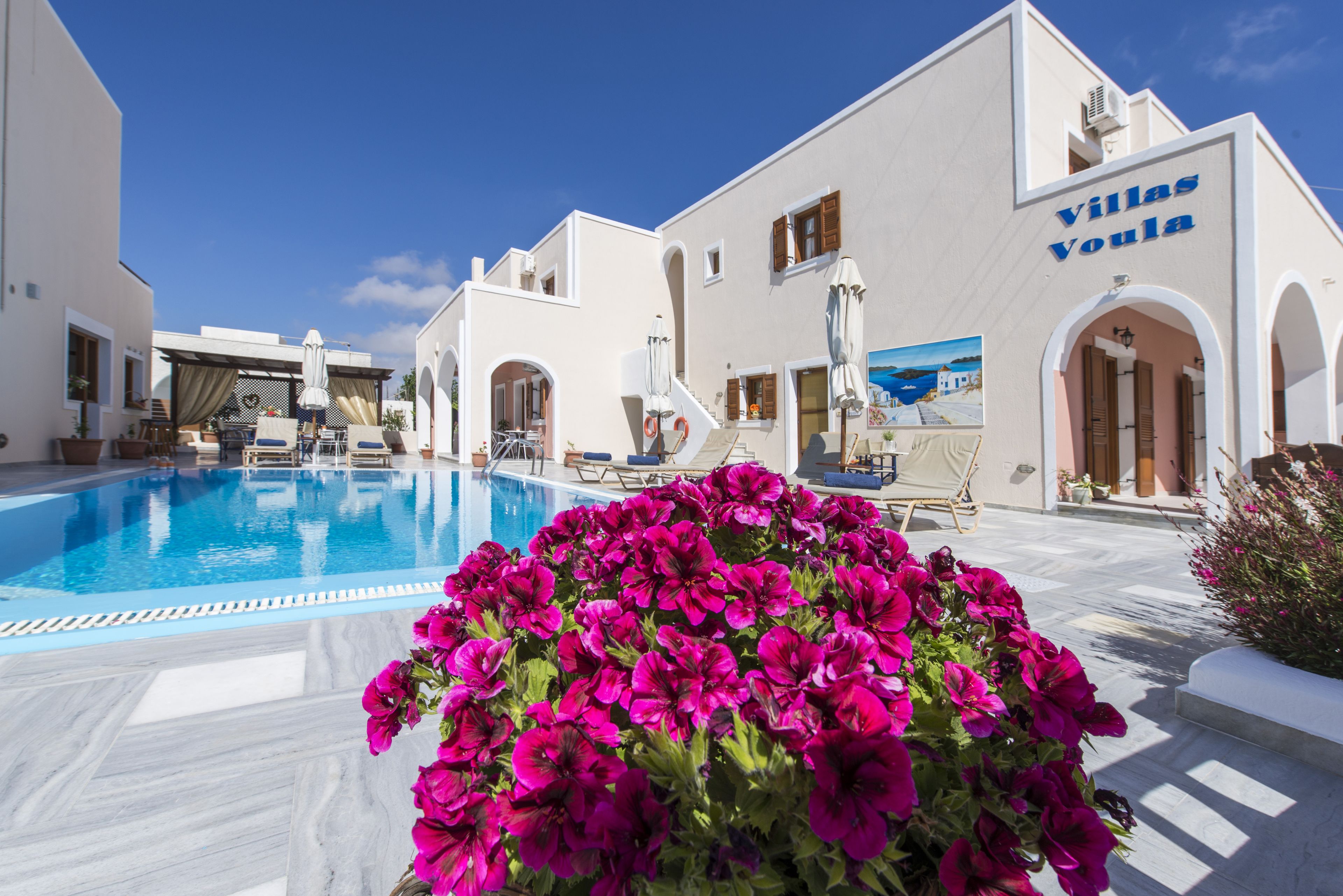 outdoor pool, pool umbrellas, pool loungers