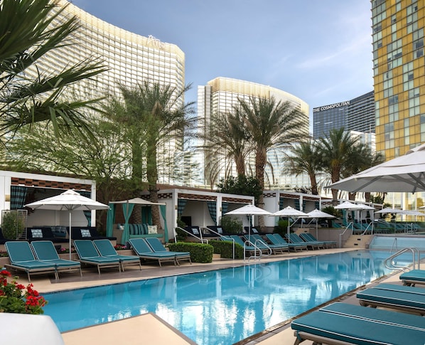 Outdoor pool, open 8:00 AM to 6:00 PM, cabanas (surcharge)