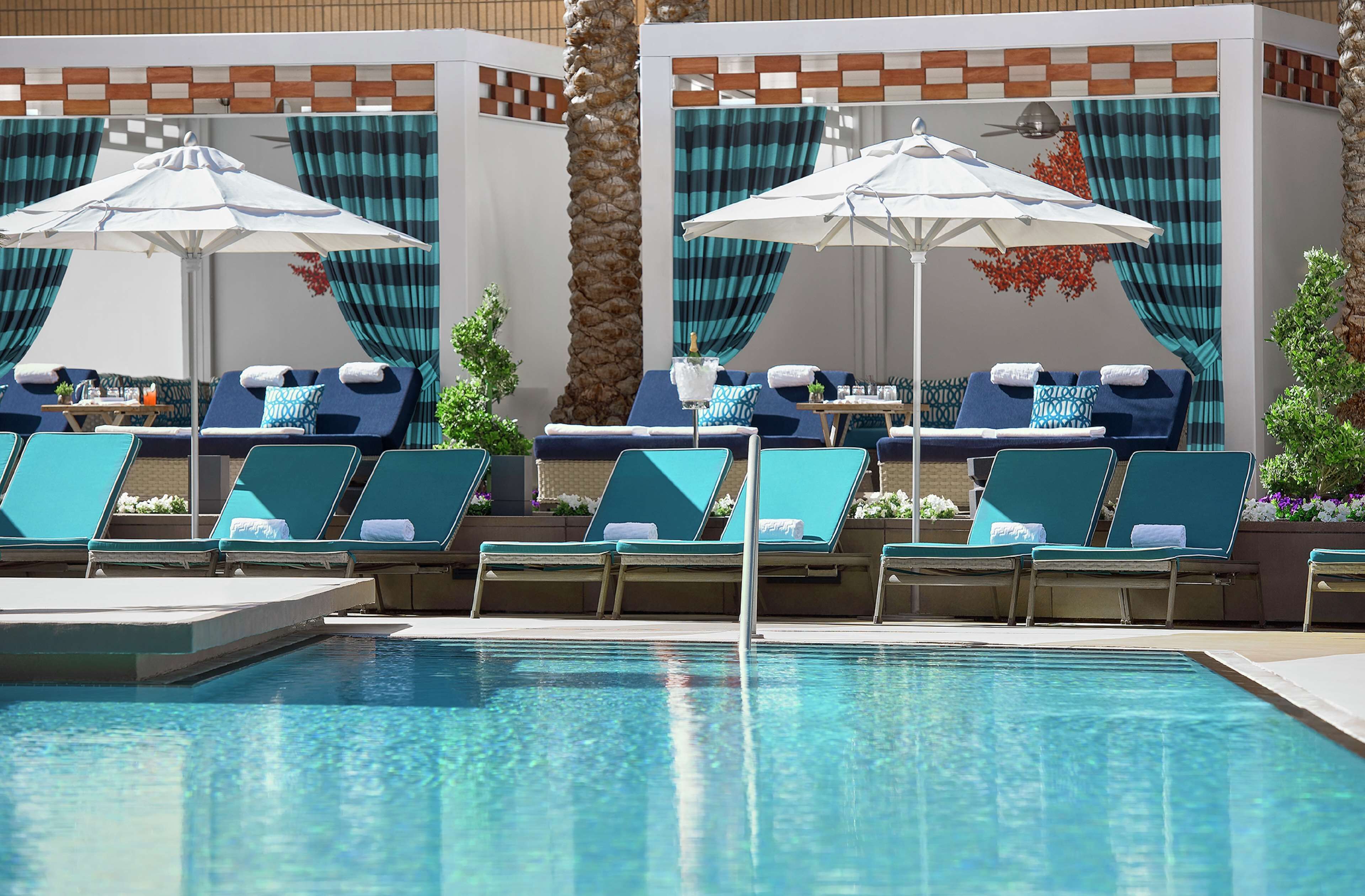 Outdoor pool, open 8:00 AM to 6:00 PM, cabanas (surcharge)