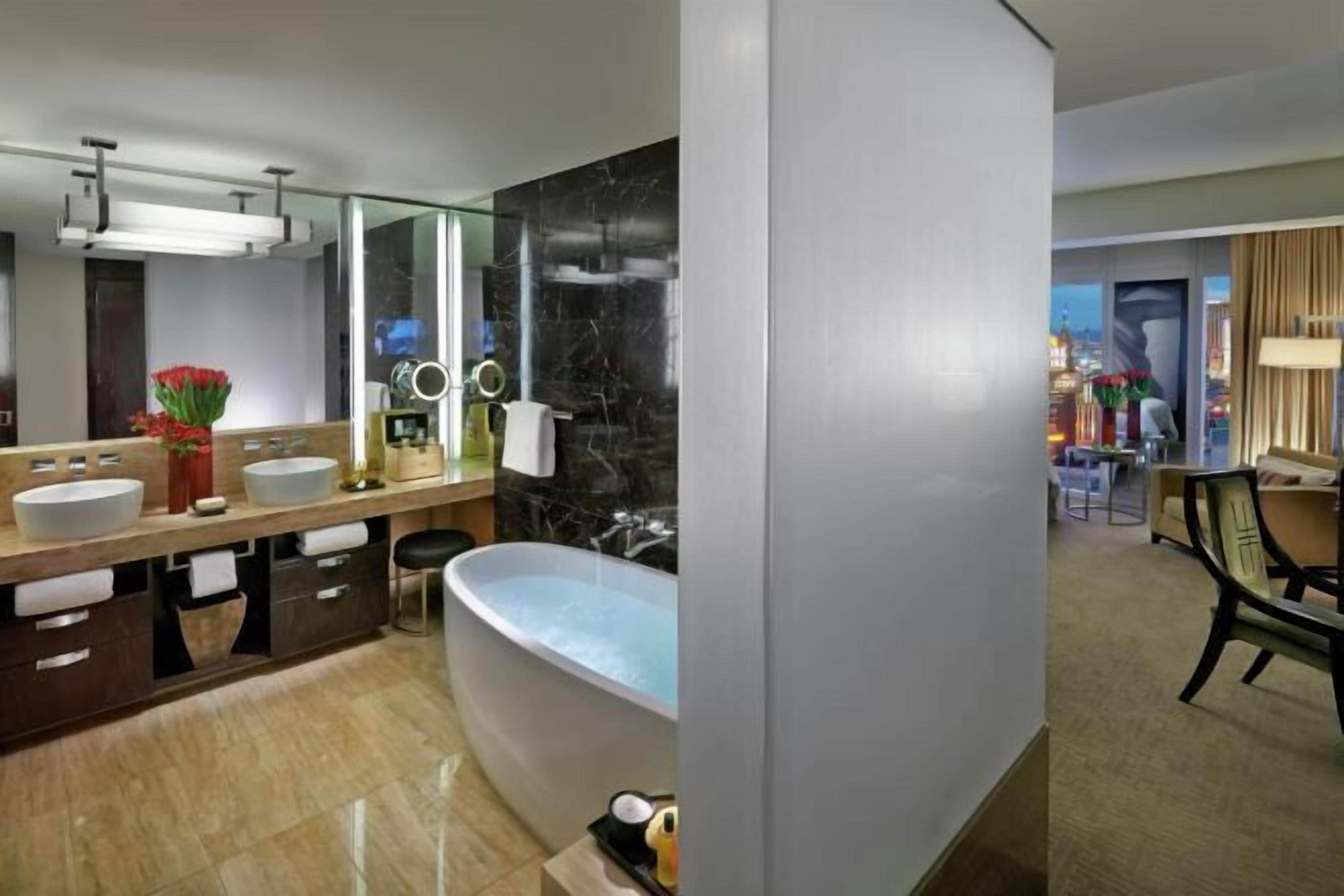 Separate tub and shower, deep soaking tub, designer toiletries