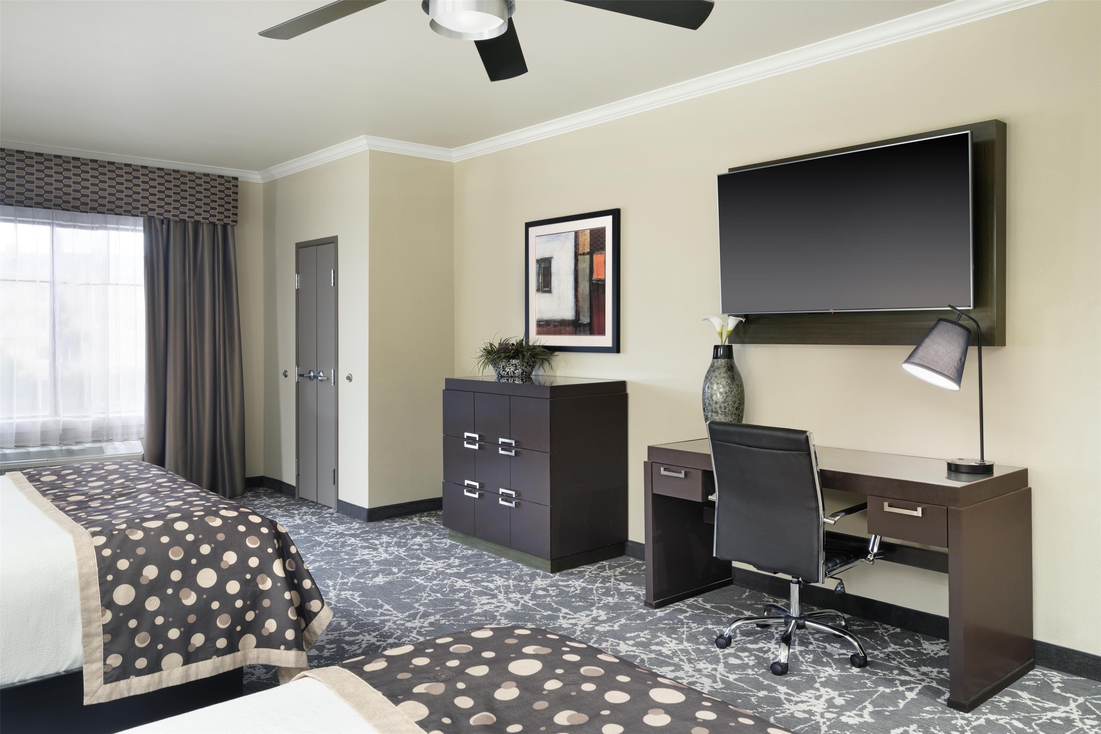 deluxe room, 2 queen beds, non smoking, refrigerator & microwave (oversized room) | premium bedding, pillow-top beds, in-room safe, desk