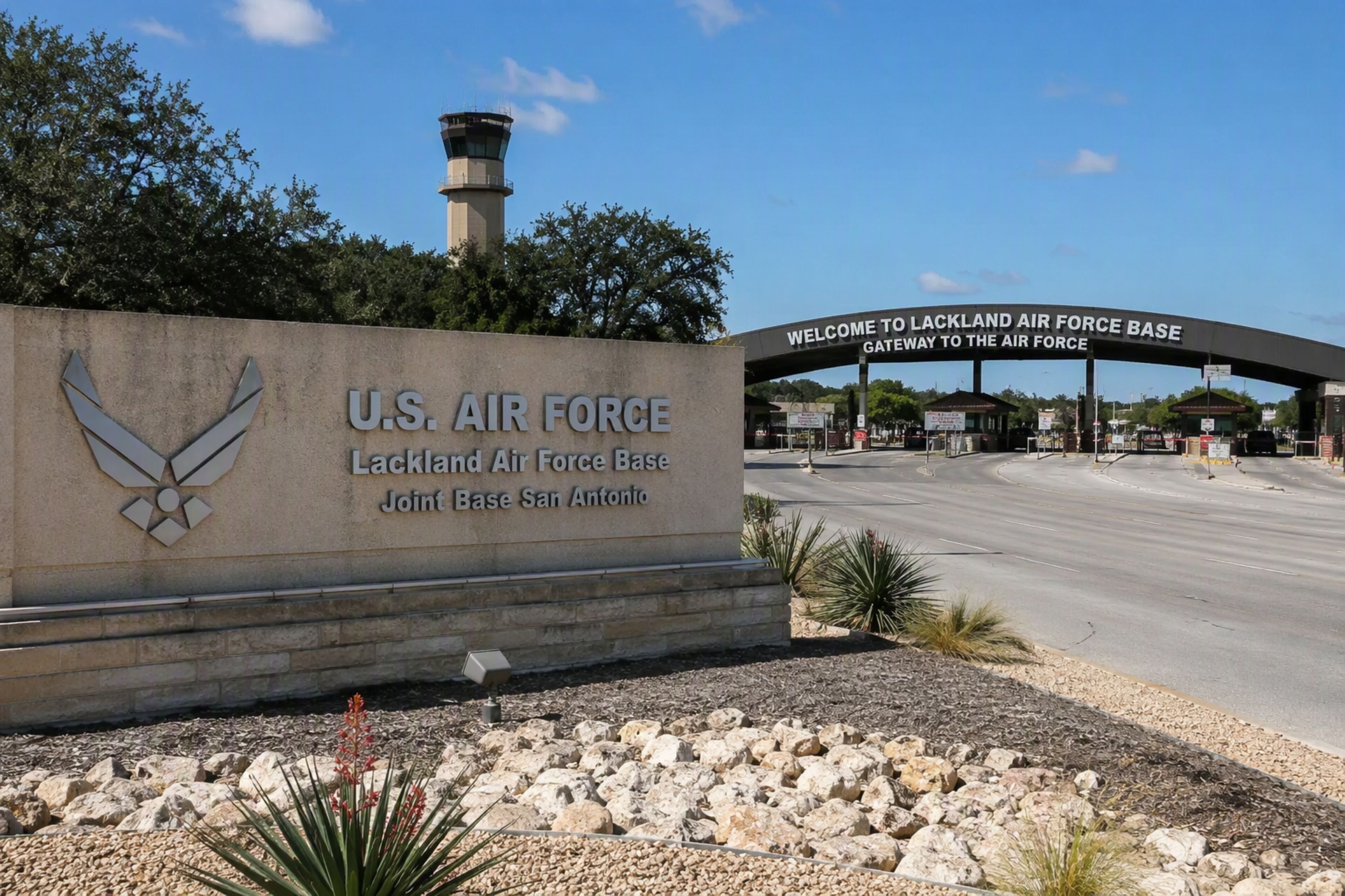 A U.S. Air Force base entrance with a sign reading 'Welcome to Lackland Air Force Base.'