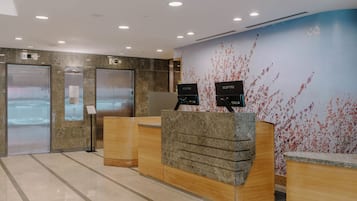 Check-in/check-out kiosk