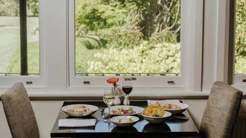 Breakfast, lunch, dinner served; garden views