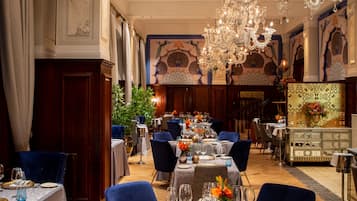 2 restaurants, breakfast, lunch, dinner served; Indian cuisine