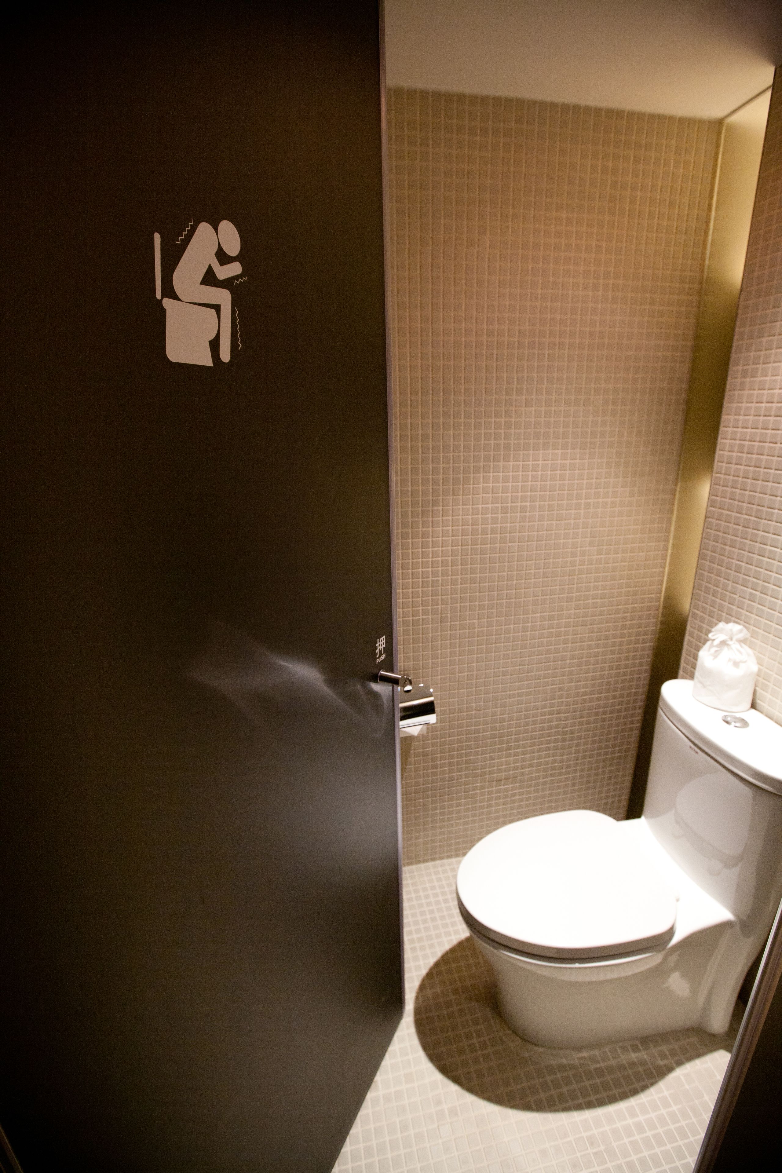 shower, hair dryer, slippers, towels