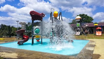 Enjoy the central water fountain and two slides in this lively park play area.