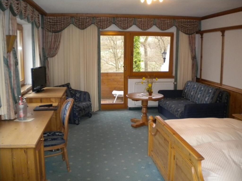 superior double room, balcony, lake view | minibar, in-room safe, desk, laptop workspace