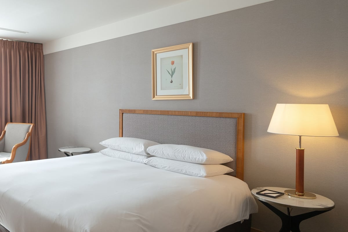 Premium bedding, pillow-top beds, in-room safe, desk