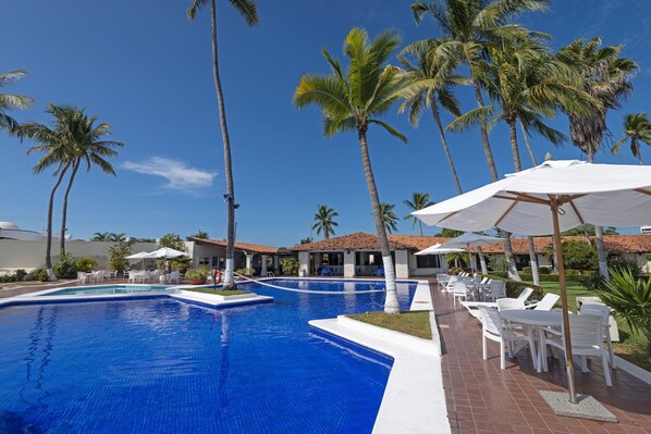 Outdoor pool, pool umbrellas, pool loungers