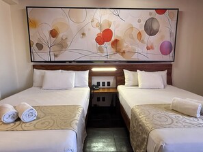 Escritorio, cortinas blackout, wifi gratis y ropa de cama 