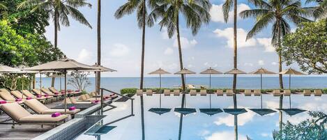 Outdoor pool, open 7:00 AM to 7:00 PM, pool umbrellas, sun loungers