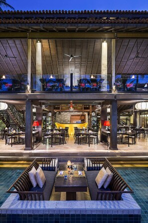 Breakfast, lunch, dinner served; international cuisine, pool views 