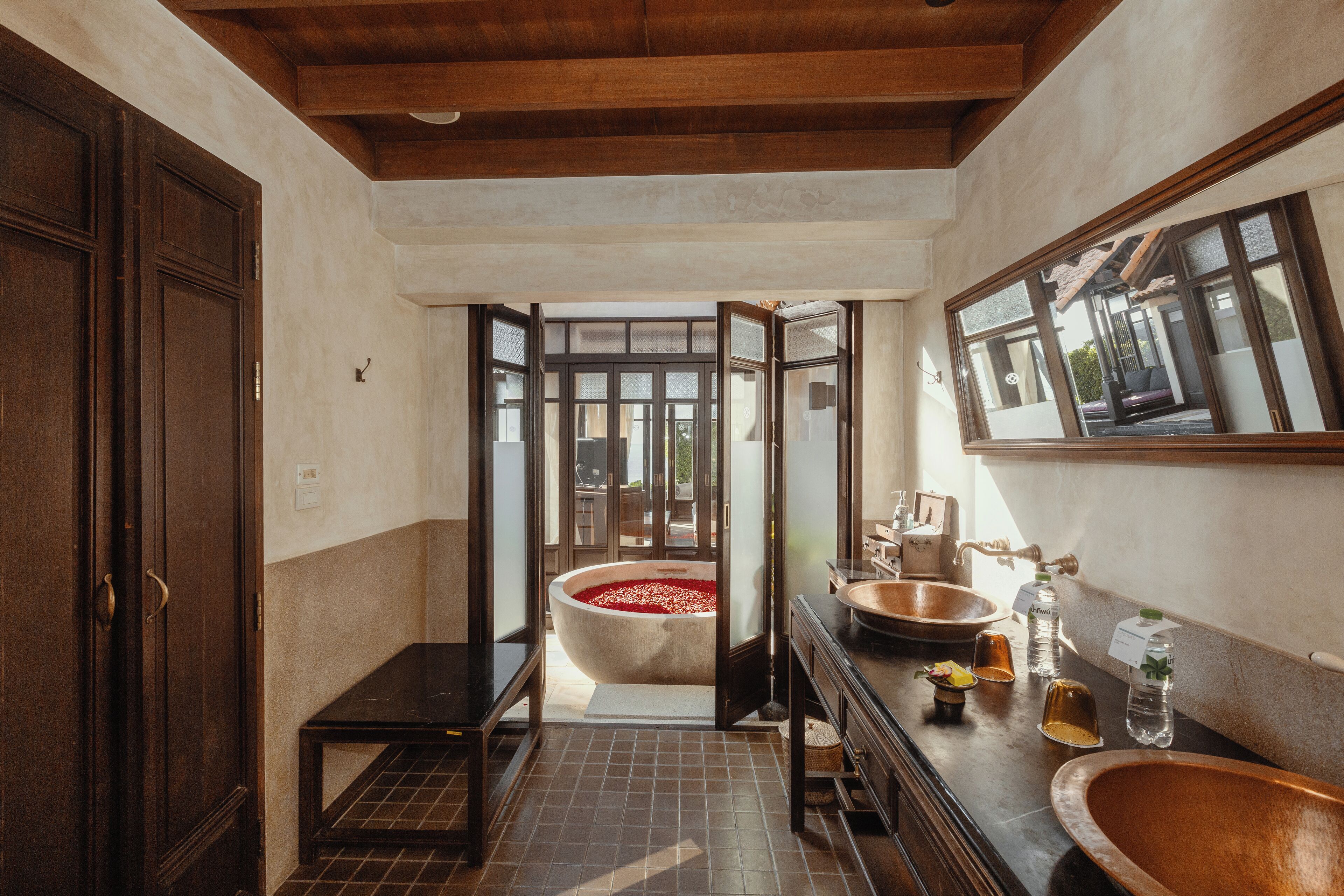 ocean pool villa king | bathroom | separate bathtub and shower, eco-friendly toiletries, hair dryer