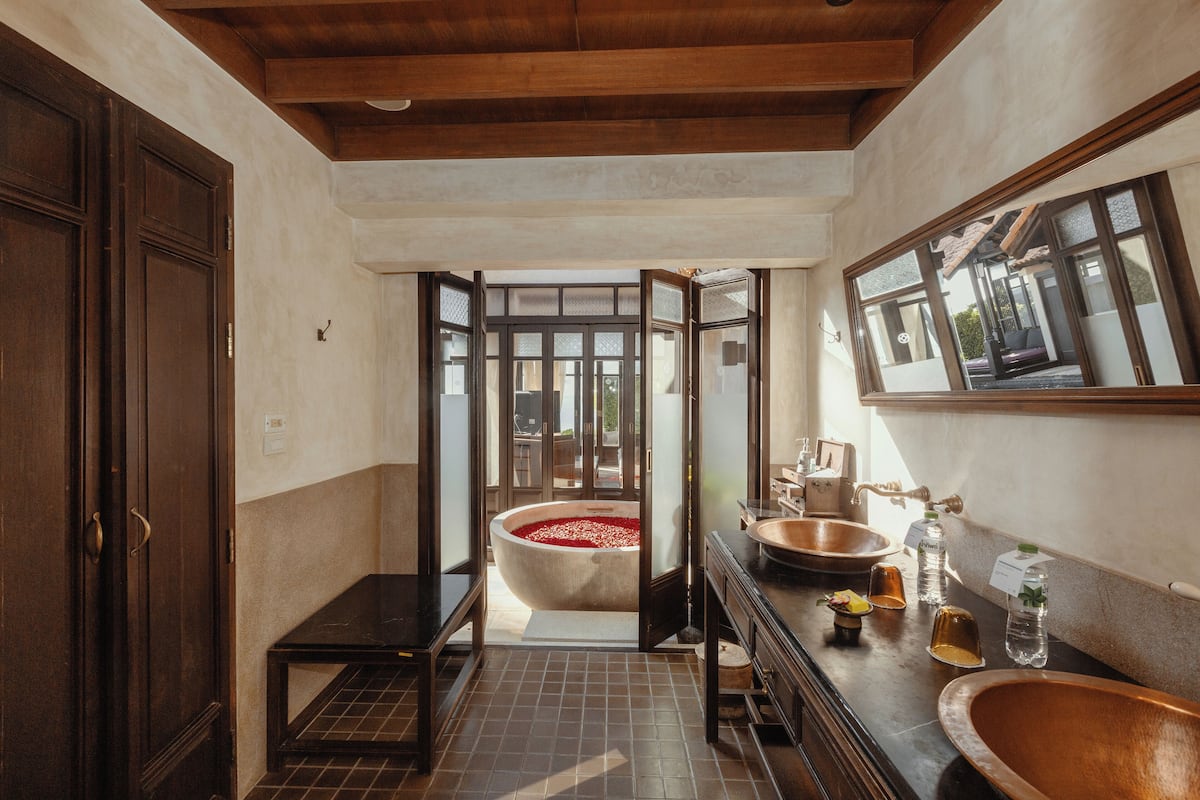 ocean pool villa king | bathroom | separate bathtub and shower, eco-friendly toiletries, hair dryer