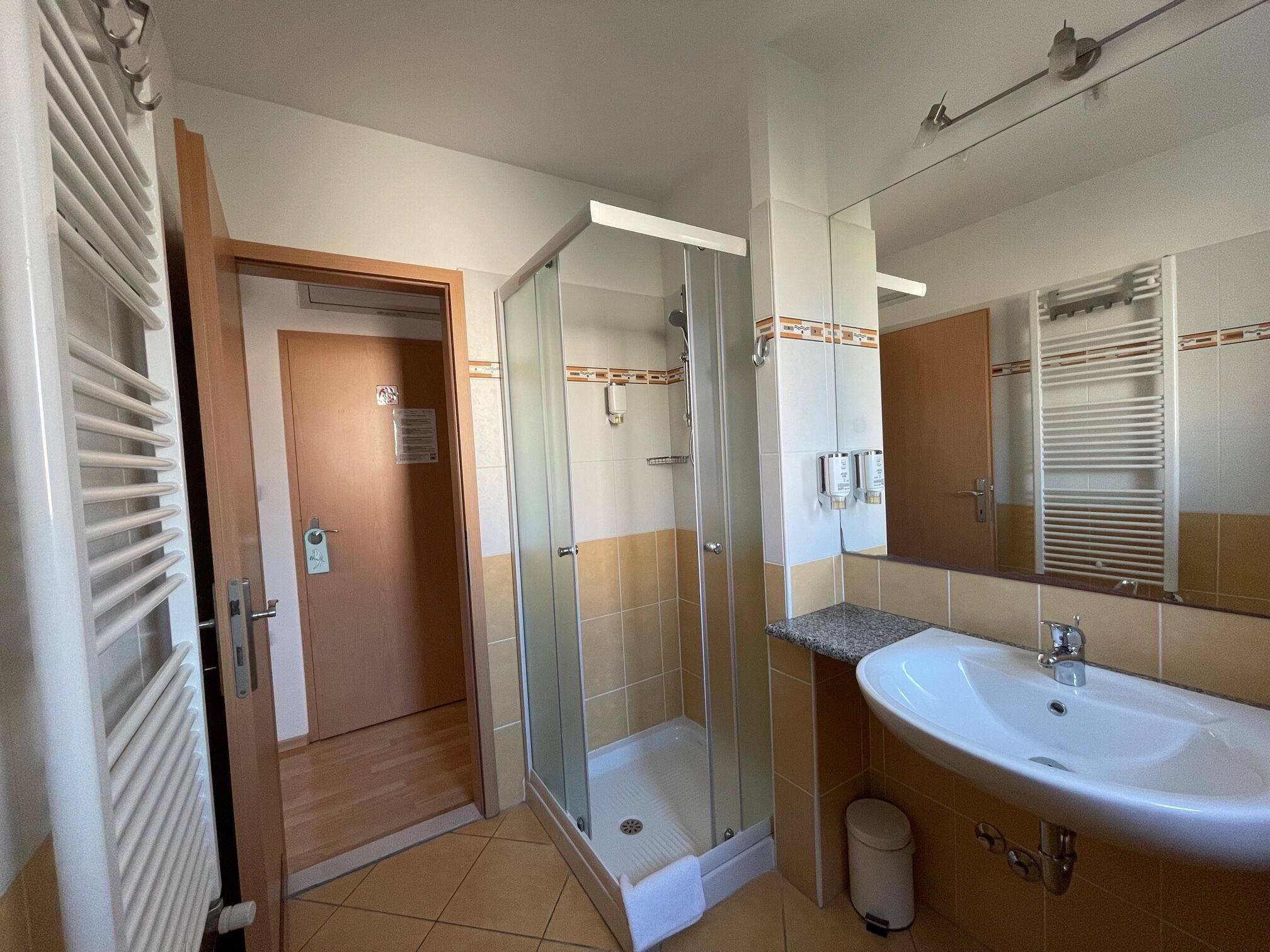 family room | bathroom | shower, hair dryer, towels, soap