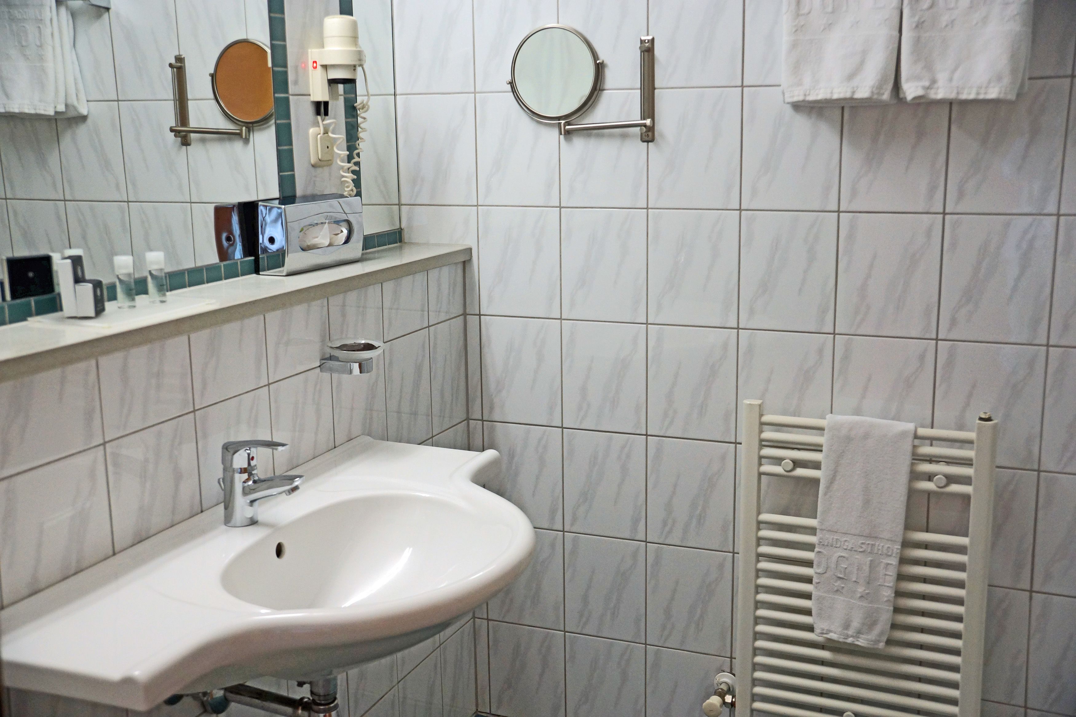 hair dryer, towels, soap, shampoo