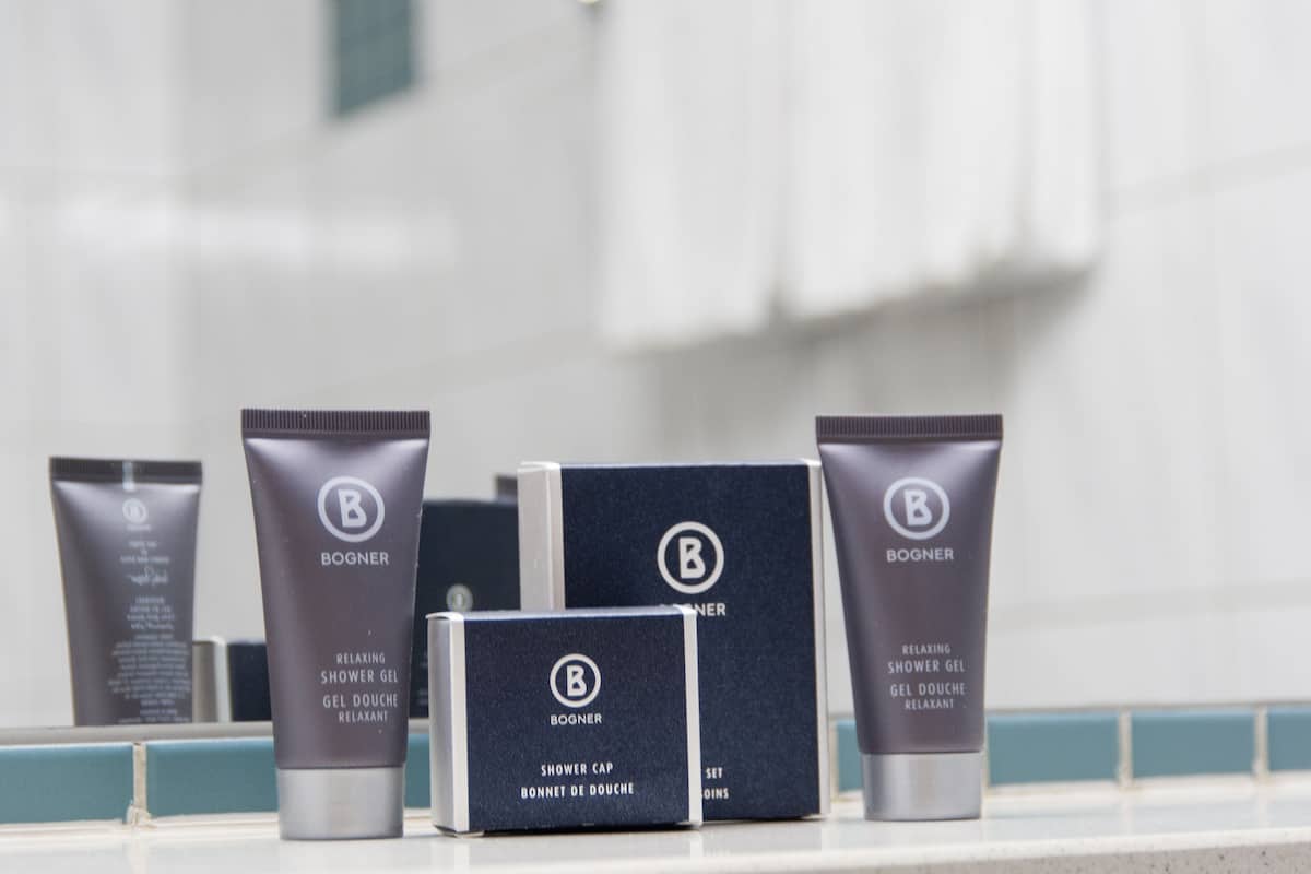 hair dryer, towels, soap, shampoo