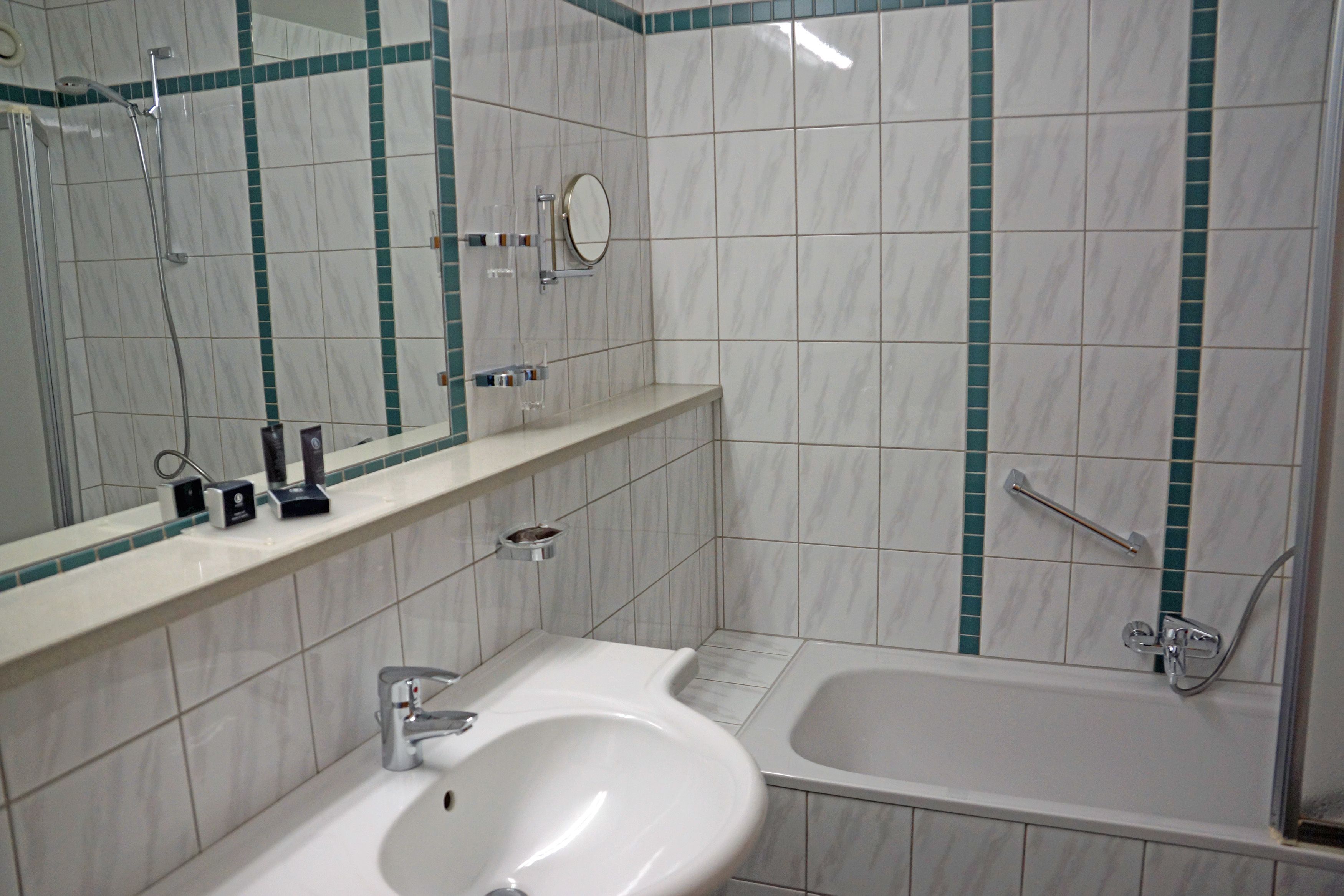 bathroom | hair dryer, towels, soap, shampoo