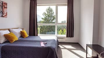 Suite Confort, 1 habitación | Caja fuerte, decoración individual, mobiliario individual y escritorio