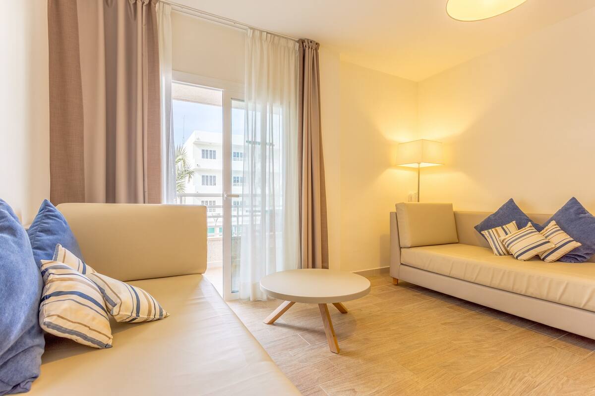 apartment, 1 bedroom, balcony, annex building (30m from hotel) | living room | 42-inch plasma tv with satellite channels, tv