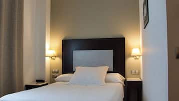 Habitación individual estándar | Ropa de cama de alta calidad, edredón y camas con efecto memoria